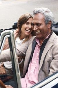 Couple in convertible car