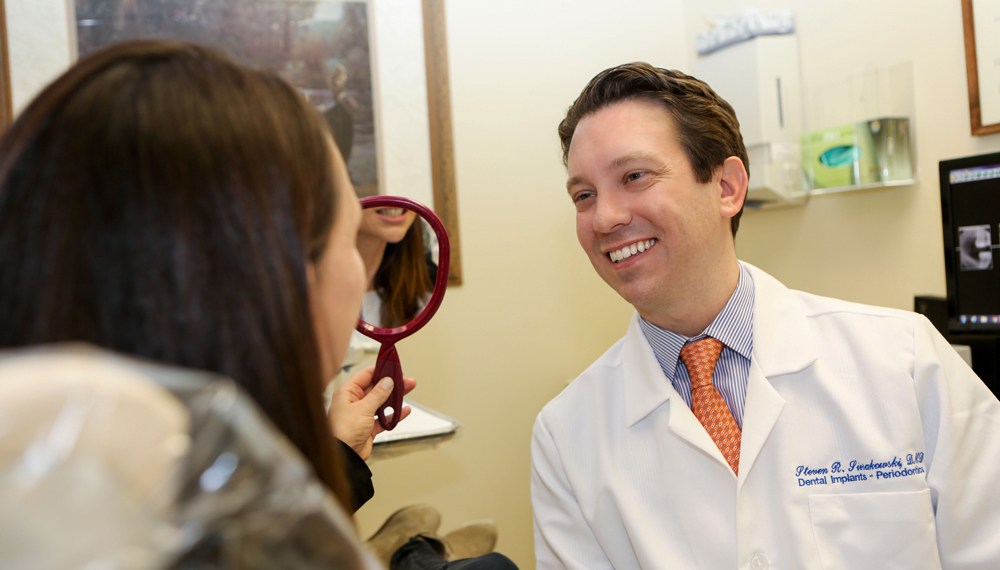 Doctor Sierakowski with patient after procedure
